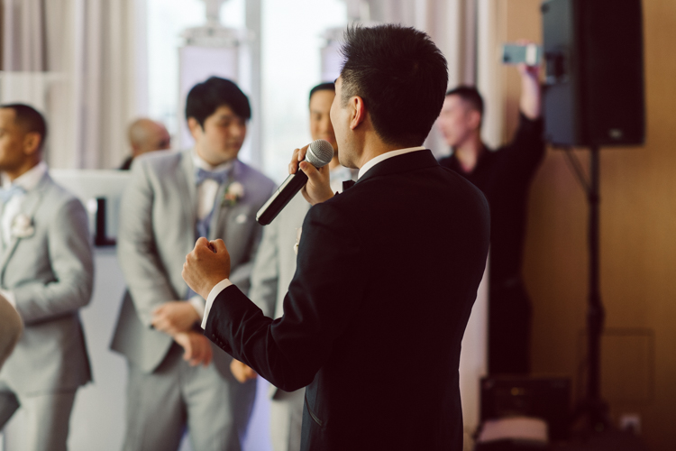 Public Hotel NYC spring rooftop wedding with Stella and Peter. NYC began to loosen COVID restrictions so events and weddings were finally allowed. Stella and Peter were able to keep their original wedding date, but unfortunately Stella's parents couldn't make it to the wedding due to COVID travel restrictions. Stella and Peter's wedding took place on 17th floor with rooftop access at the Public Hotel. Their wedding ceremony was on the rooftop, as well as their first look and some photos then we wandered around the hotel and took some epic photos at the pent house and escalator. Public Hotel NYC was so fun to photograph and I had the coolest, the most chill couple to work with. Stella and Peter's epic wedding at Public Hotel NYC photographed by Karis | Hey Karis.